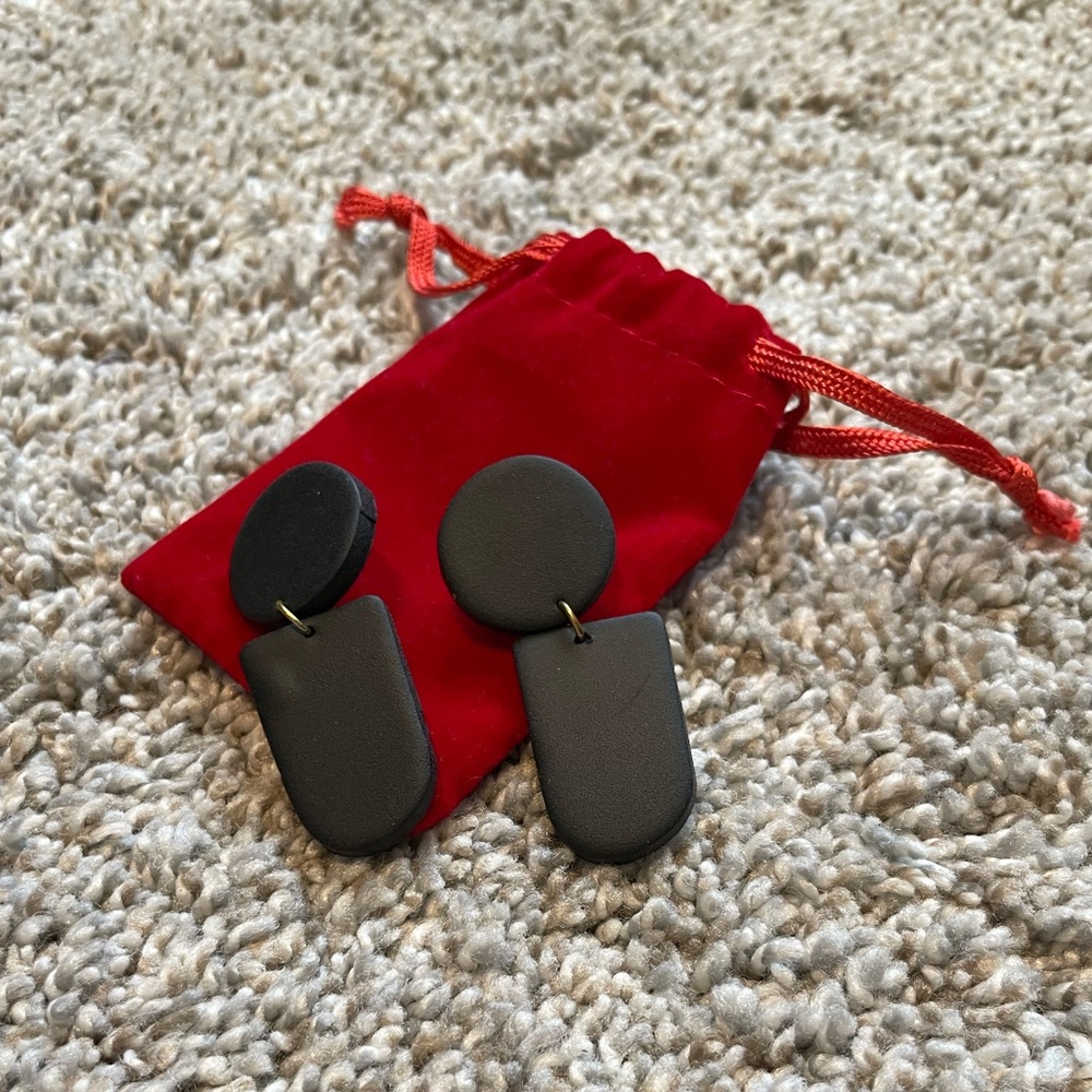 Local artist-made earrings, lightweight, black.